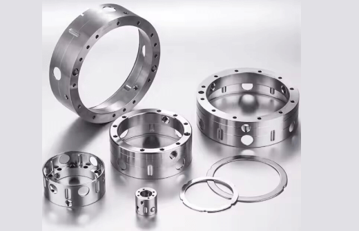 Precision-machined metal rings with multiple holes