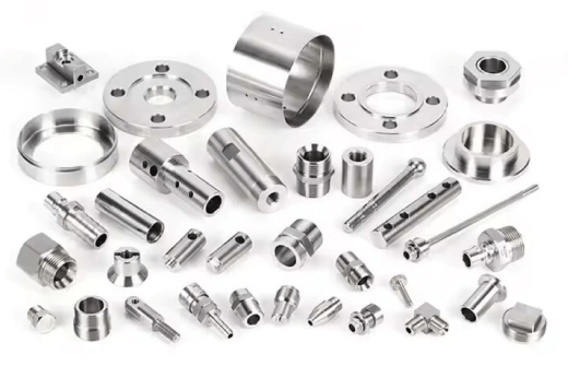 Variety of CNC-machined metal components and fittings.